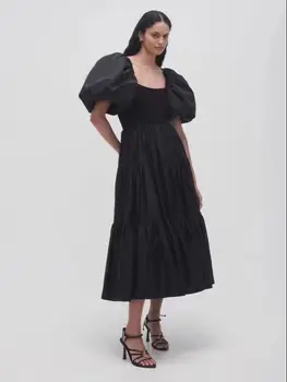 קיץ חדש צבע מוצק אופנה פשוטה ואלגנטית כותנה בועה קצר שרוול אלסטי חזה מותניים בכיס השמלה.